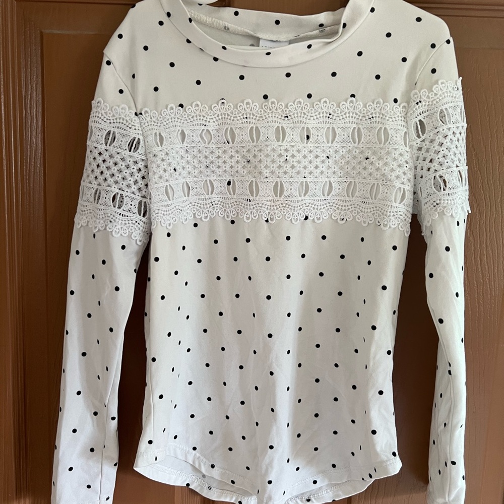 Girls long sleeve polka dot shirt.